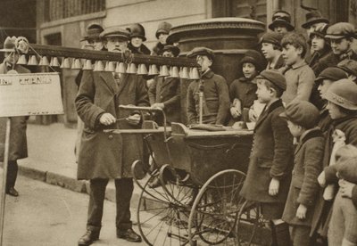 Street entertainment for children: portable bells, London by English Photographer
